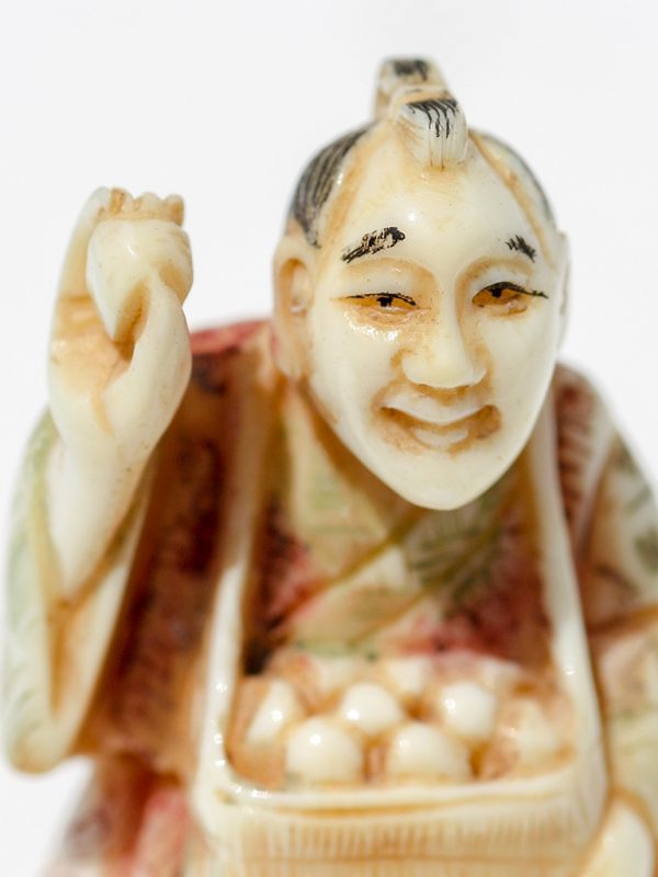 Unknown Artist - Man Selling Eggs Netsuke