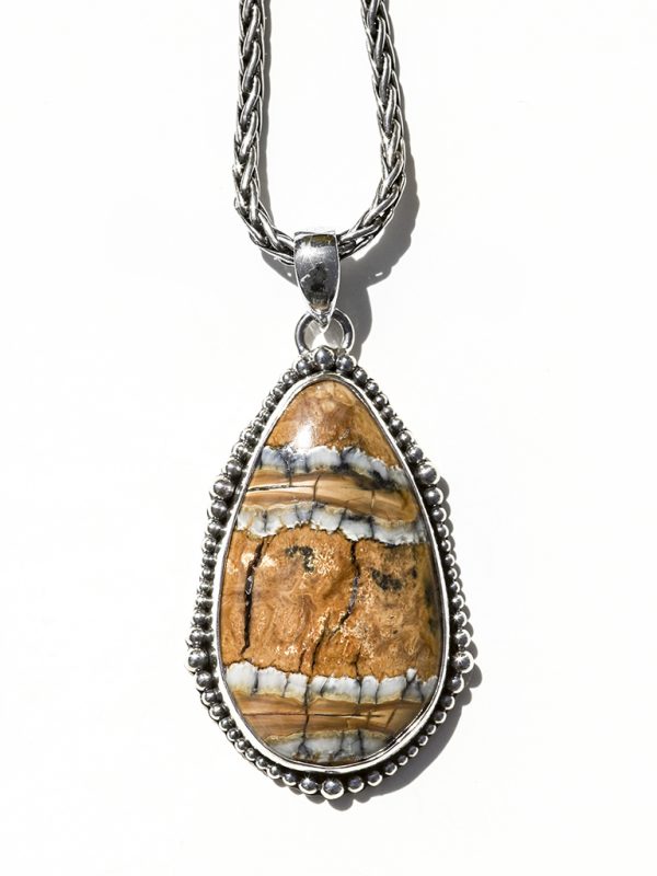 Mammoth Tooth Pendant - Sterling Silver Setting