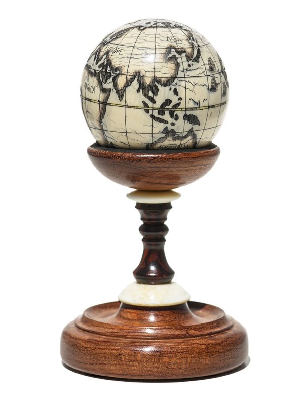 Scrimshaw Globe on Ivory Cue Ball