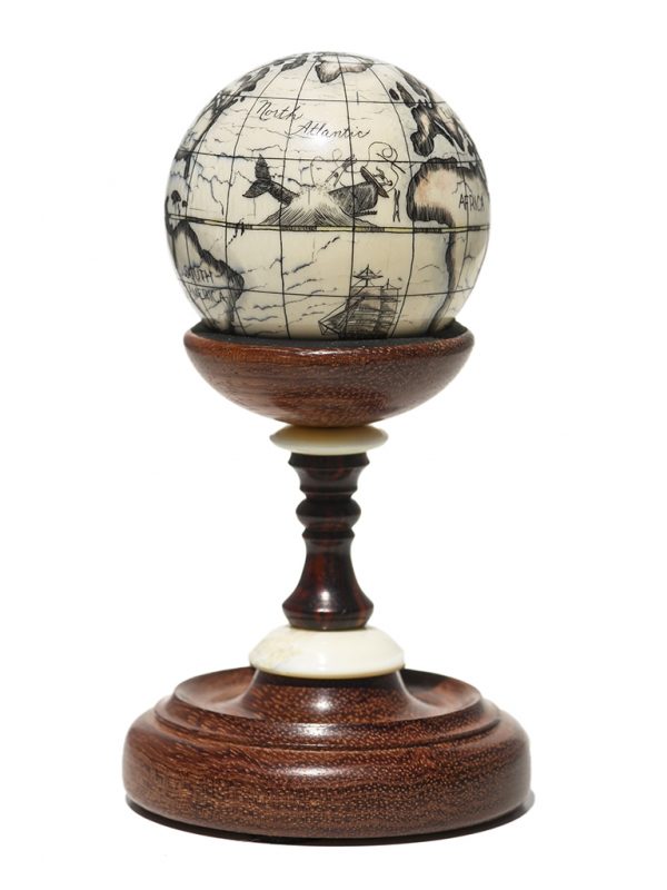 Scrimshaw Globe on Ivory Cue Ball