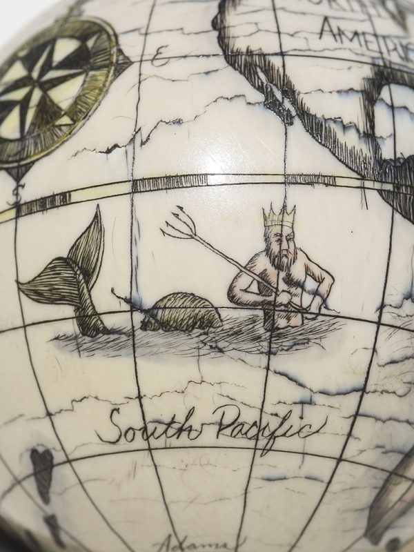 Scrimshaw Globe on Ivory Cue Ball