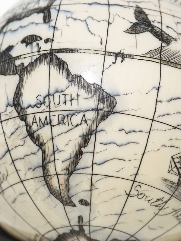 Scrimshaw Globe on Ivory Cue Ball