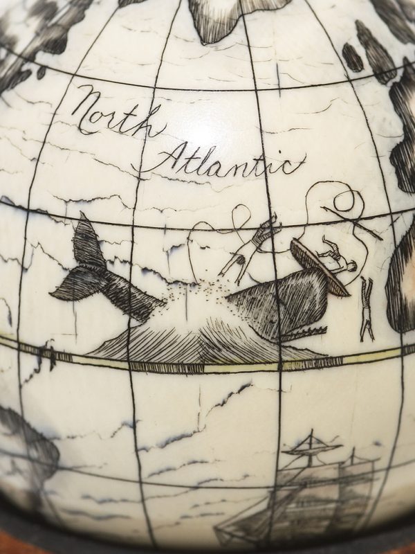 Scrimshaw Globe on Ivory Cue Ball