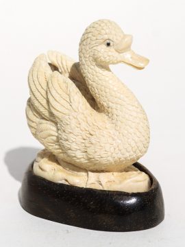 Unknown Carver - Graceful Swimming Swan