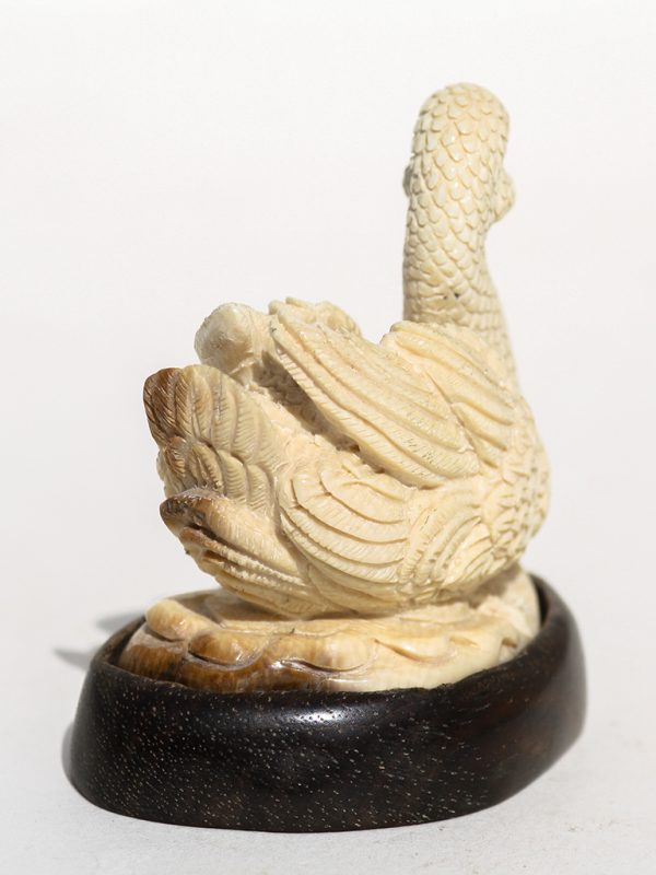 Unknown Carver - Graceful Swimming Swan